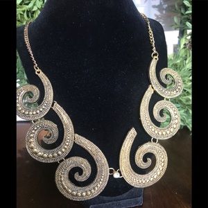 Gold tone statement necklace